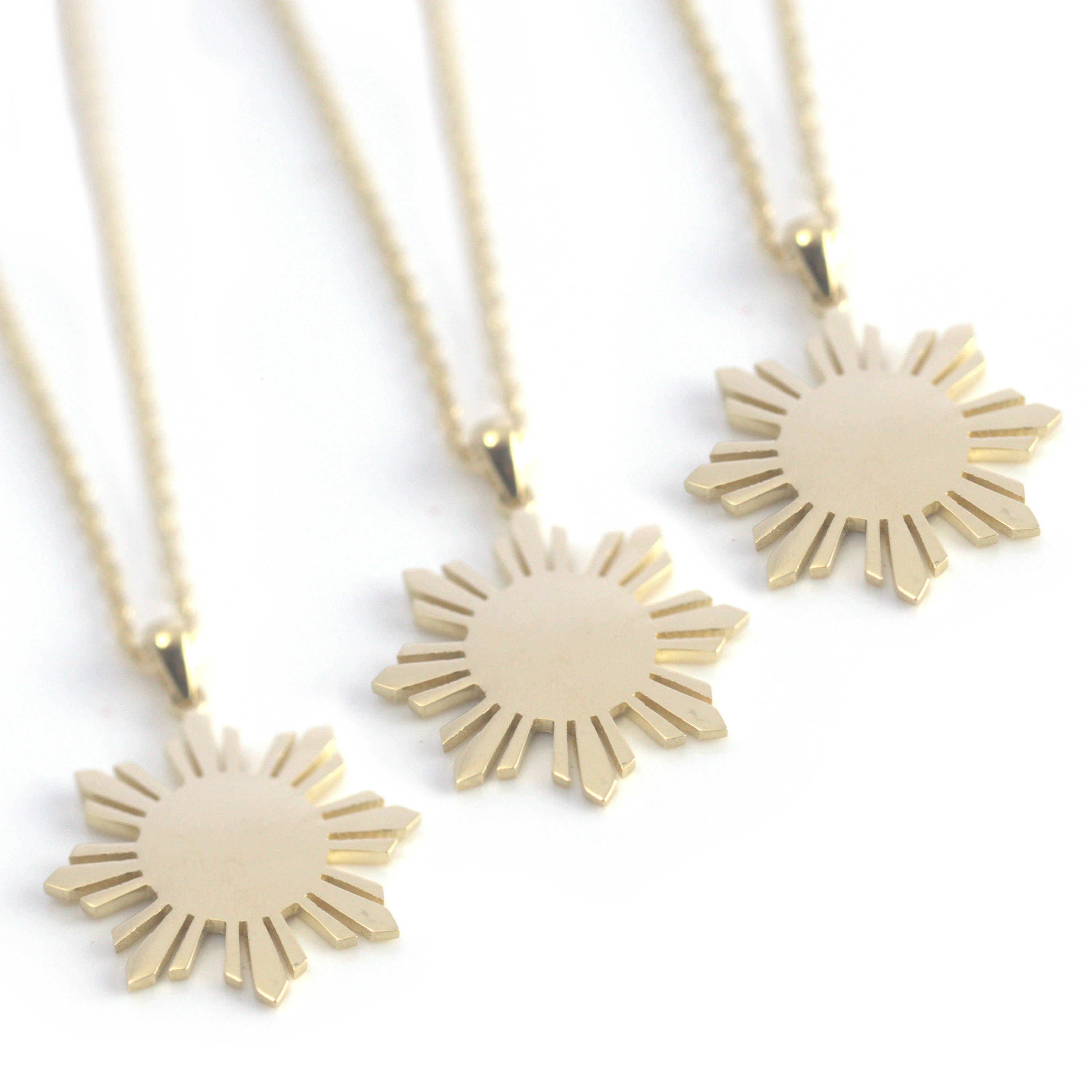 Gold Philippines sun necklace